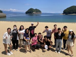 Nagasaki Wesleyan Univesity international students enjoy a day at the beach